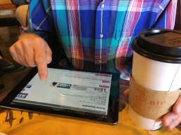 Mid-morning coffee with an iPad.